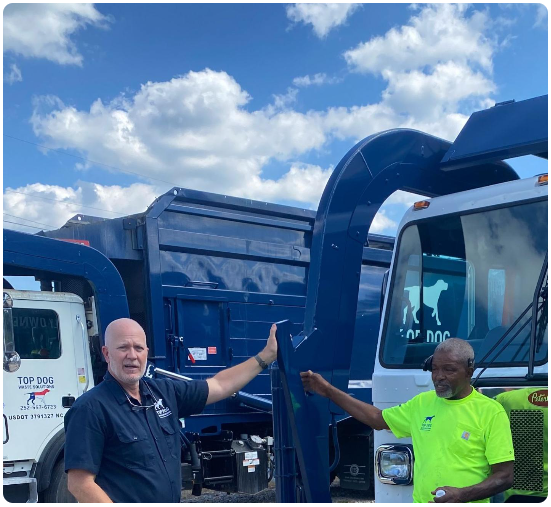 Top Dog Waste's Tim Everett and staff