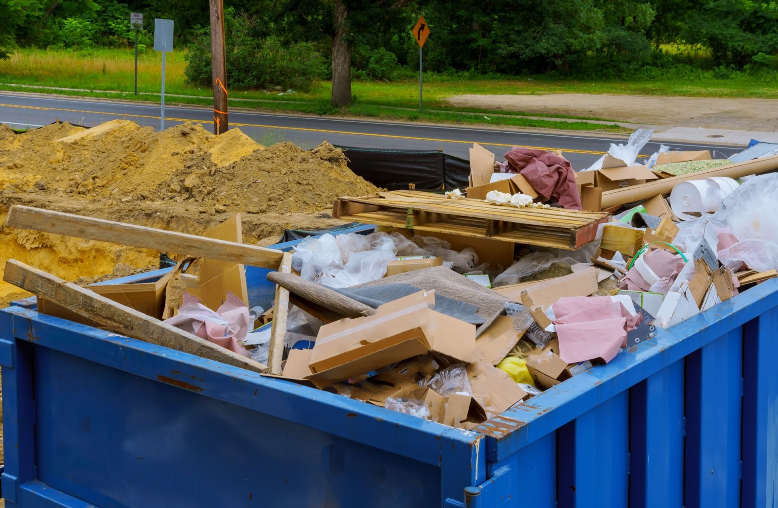 Debris from construction in a dumpster. 