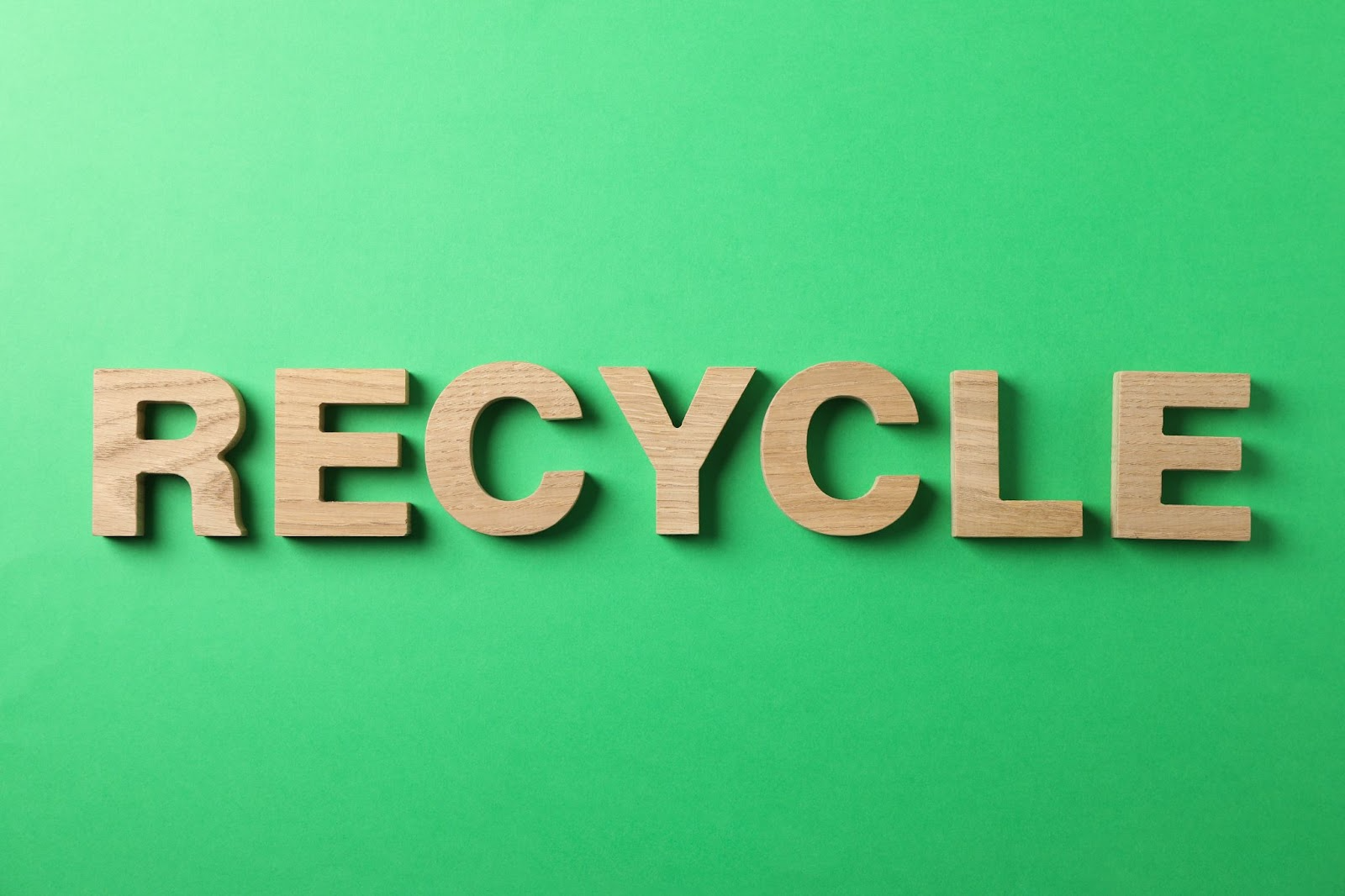 Word recycle made out of wooden letters. 